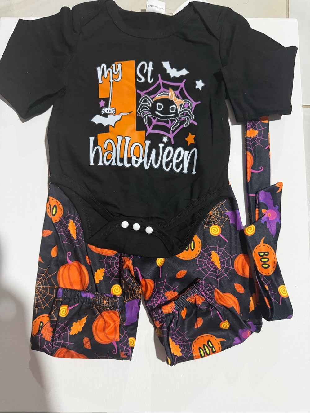 Halloween baby bodysuit and pants set with orange pumpkins, purple bats,